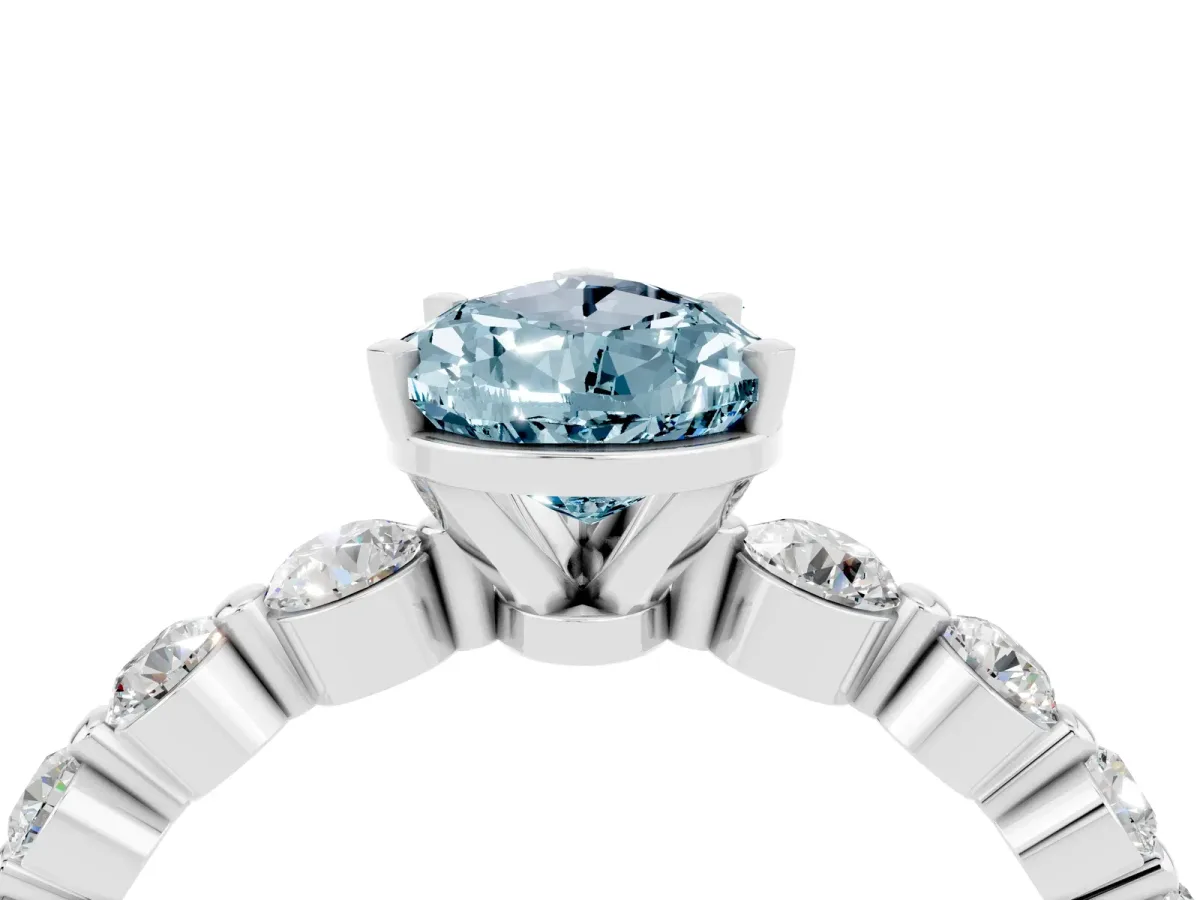 Pear Cut Solitaire Aquamarine Ring with Pave Band and Four-Prong Setting Silver