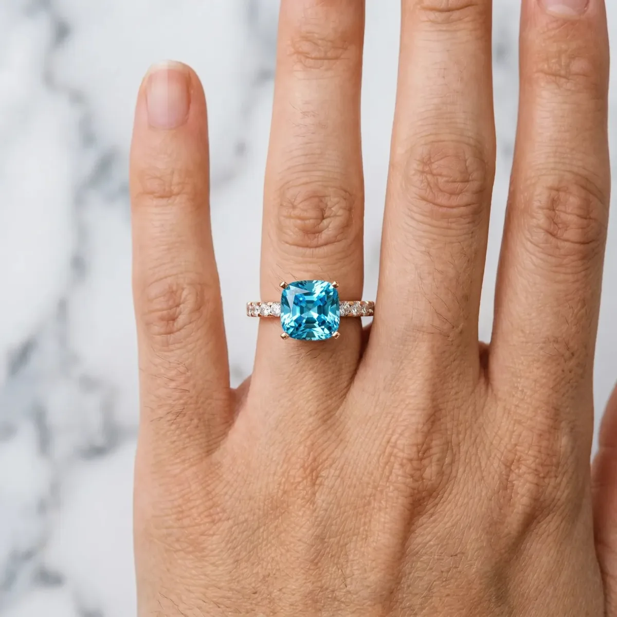 Cushion Cut Blue Topaz Solitaire Ring with Round Pavé Band and Four-Prong Setting Rose gold