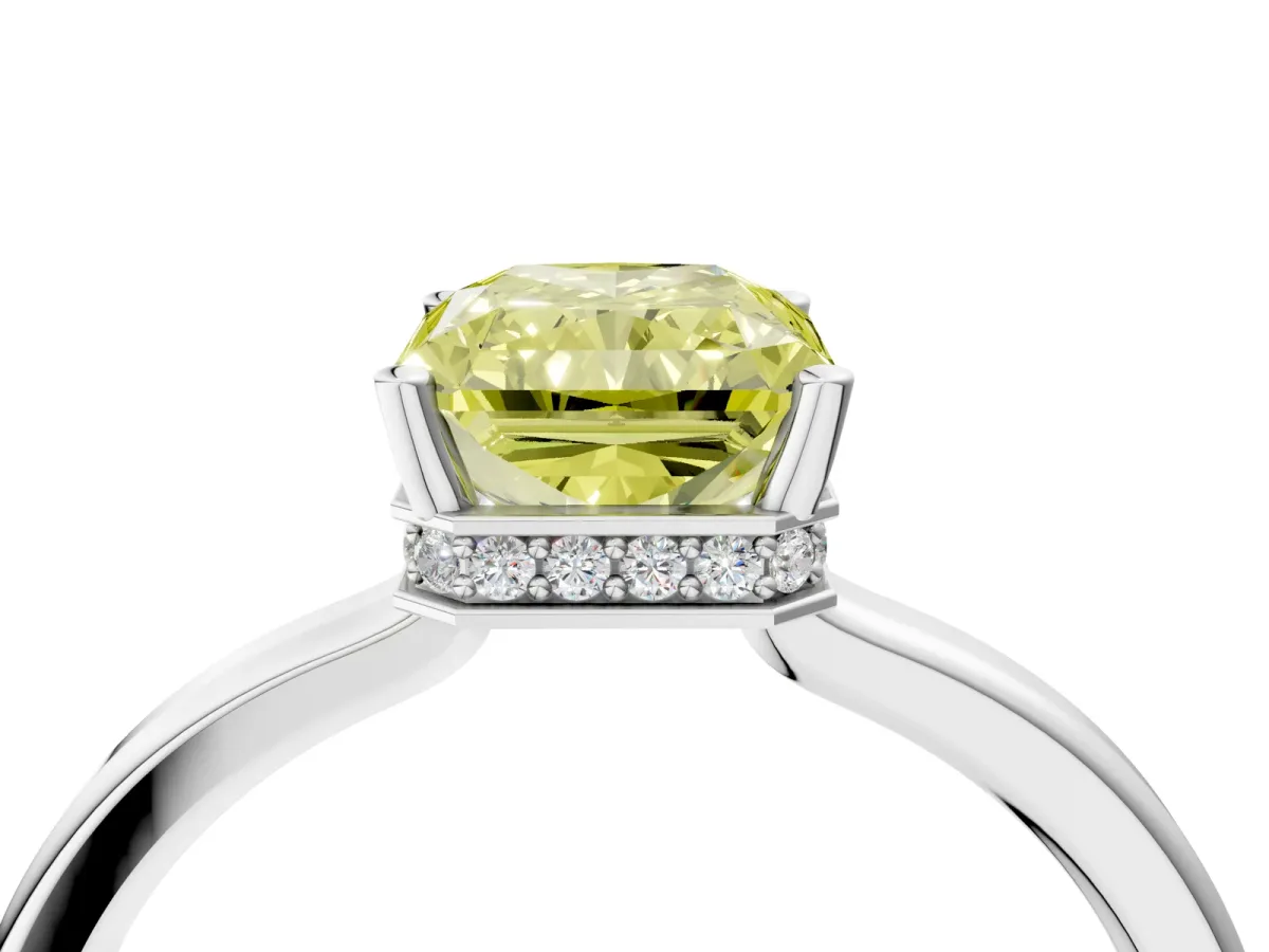 Fancy Yellow Radiant Cut Cut Solitaire Engagement Ring with Four-Prong Setting on a Classic Band Platinum