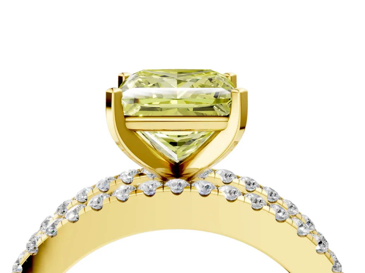 Fancy Yellow Princess Cut Diamond Solitaire Ring with Pavé and Channel Set Band Yellow gold