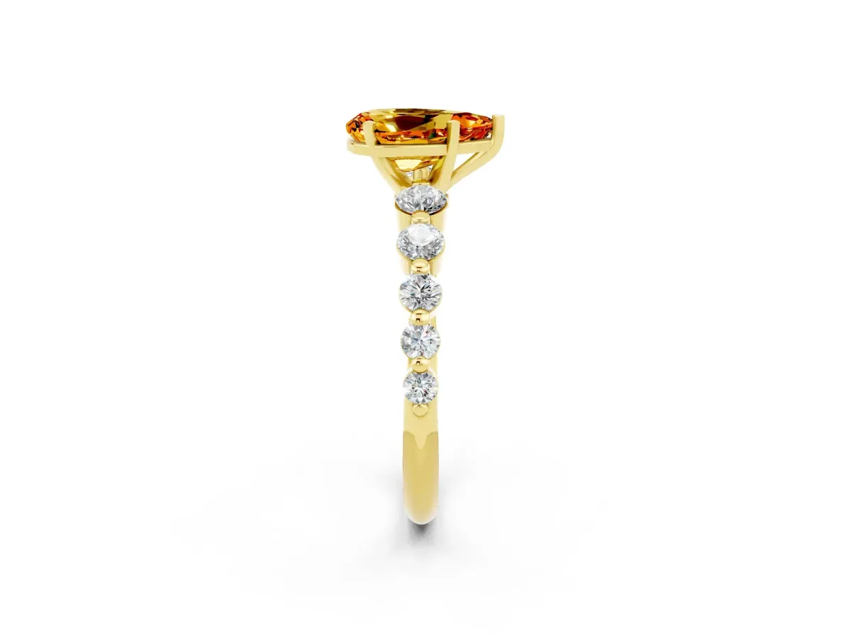 Pear Cut Solitaire Citrine Ring with Pave Band and Four-Prong Setting Yellow gold