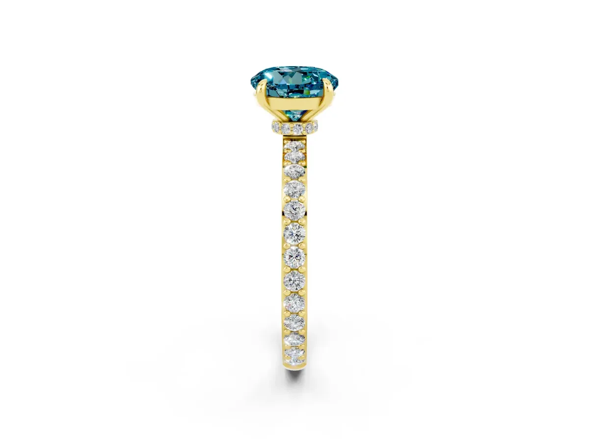 Round Cut Blue Topaz Solitaire Engagement Ring with Pavé Band and Four-Prong Setting Yellow gold