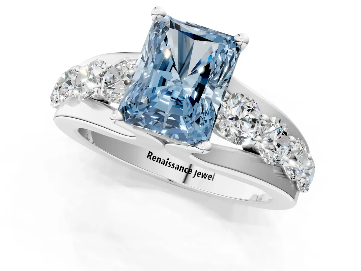 Fancy Blue Radiant Cut Brilliant Solitaire with Side Stones on a Pave Band and Four-Prong Setting Platinum