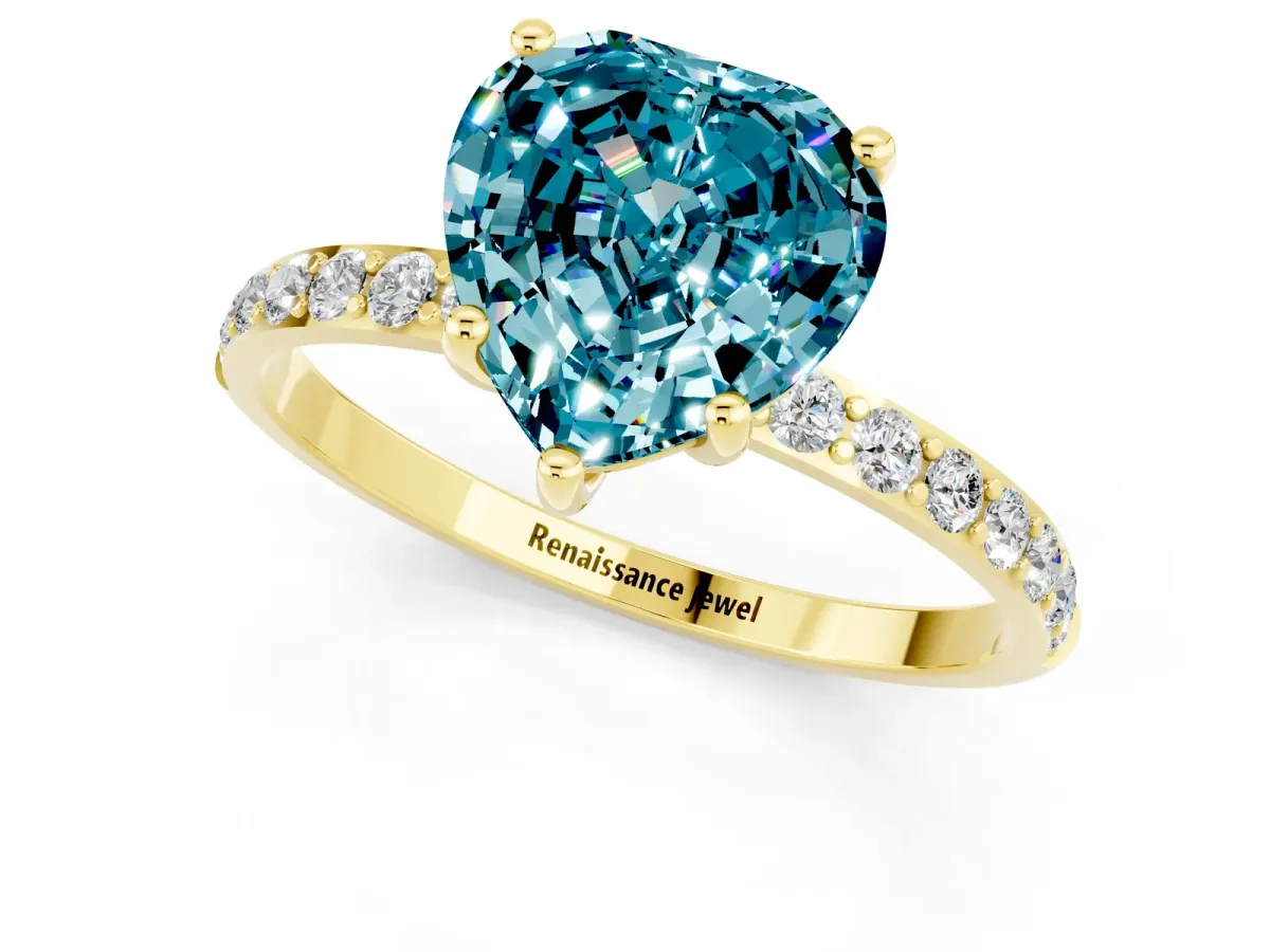 Heart Cut Blue Topaz Solitaire Ring with Round Pavé Band and Prong Setting Yellow gold