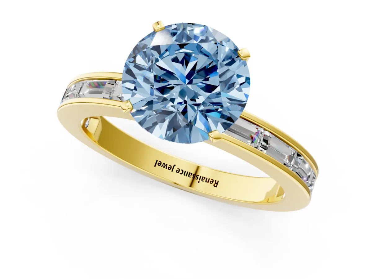 Fancy Blue Round Cut Solitaire Diamond Ring with Channel-Set Baguette Band and Four-Prong Setting Yellow gold