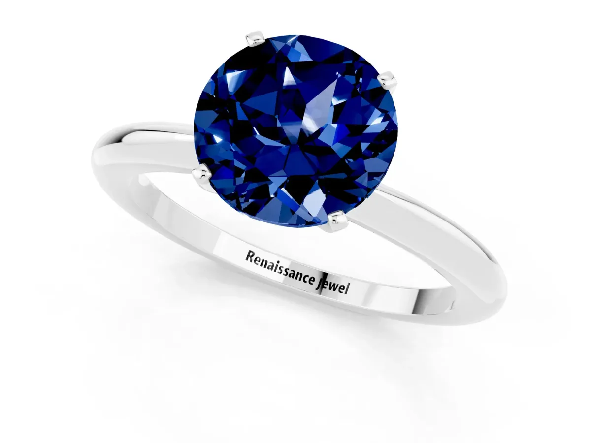 Round Cut Blue Sapphire Solitaire Ring with Six-Prong Setting and Classic Band Silver