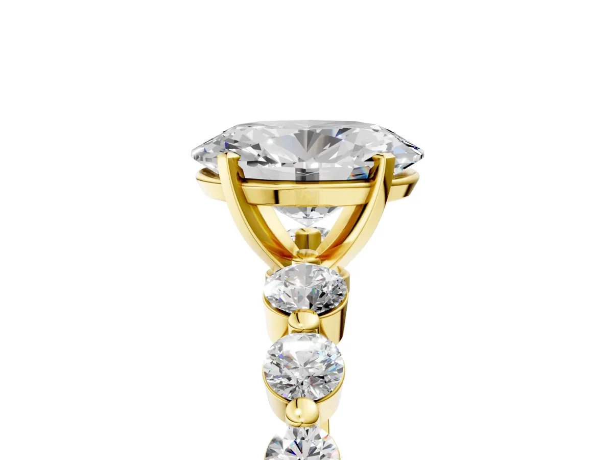 Oval Cut Solitaire Diamond Ring with Pave Band and Four-Prong Setting Yellow gold