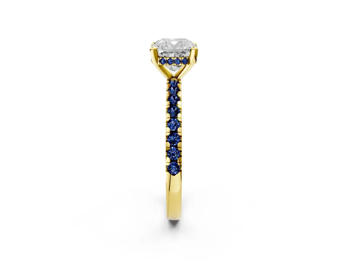 Cushion Cut Diamond Solitaire Ring with Round Blue Sapphire Pavé Band and Four-Prong Setting Yellow gold