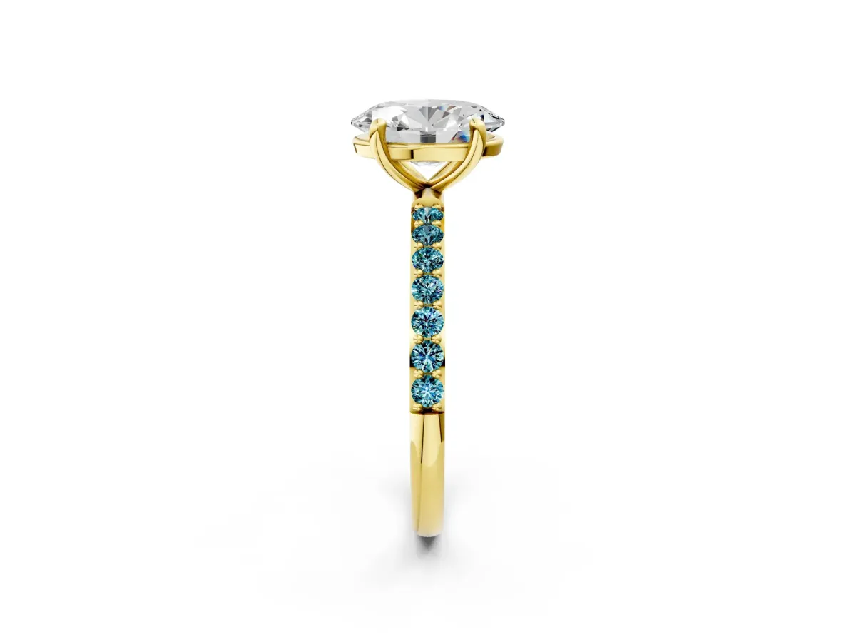 Oval Cut Diamond Solitaire Ring with Round Blue Topaz Pavé Band and Prong Setting Yellow gold