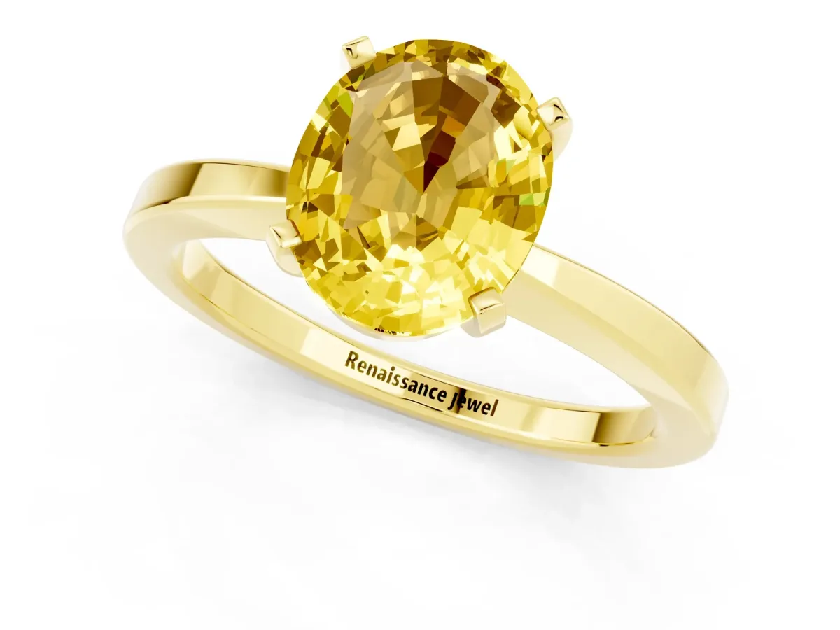 Oval Cut Yellow Sapphire Solitaire Engagement Ring with Classic Band and Four-Prong Setting Yellow gold
