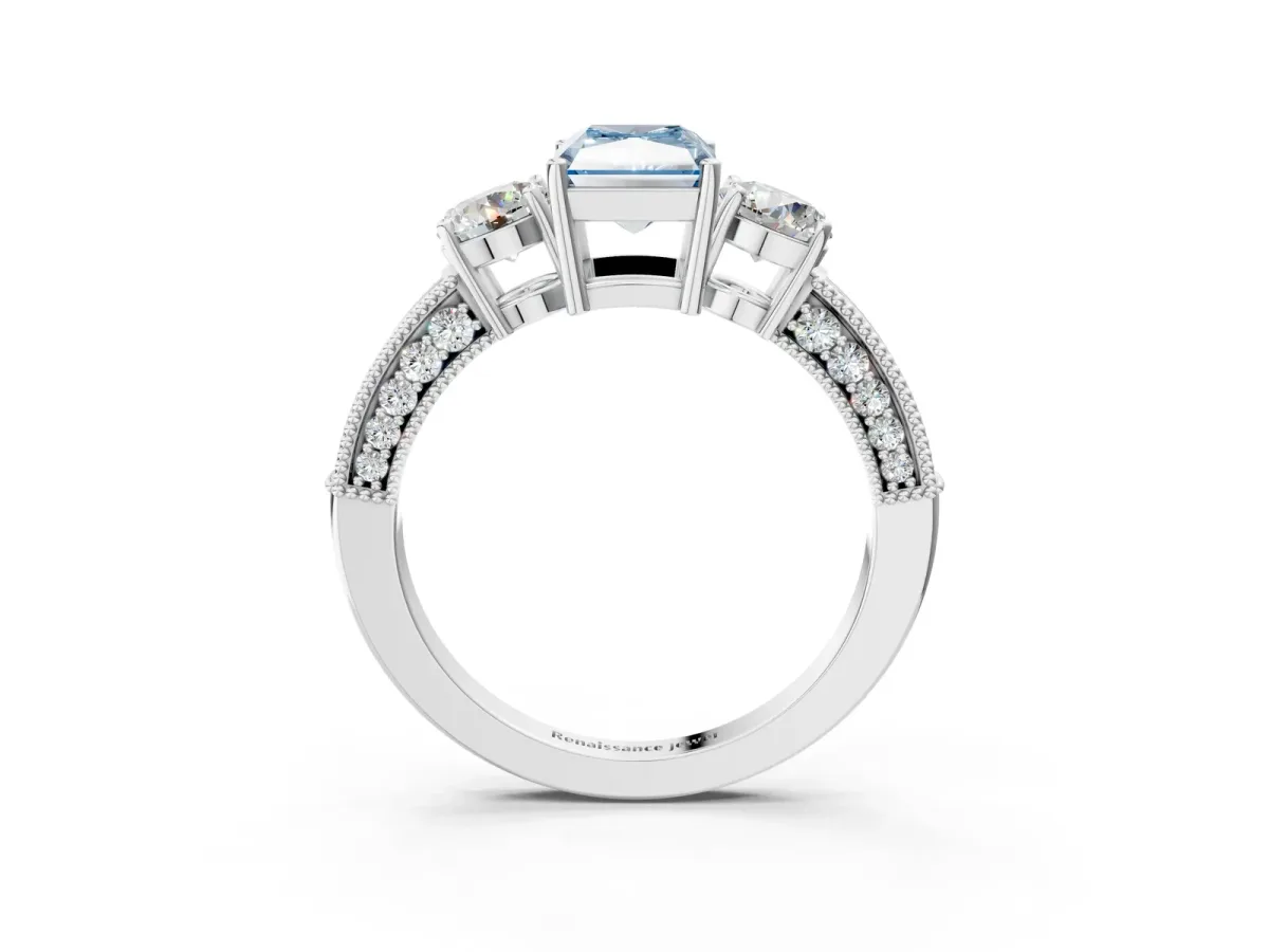 Fancy Blue Radiant Cut Three-Stone Diamond Ring with Pavé Band and Four-Prong Setting Platinum
