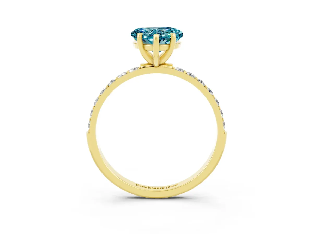 Heart Cut Blue Topaz Solitaire Ring with Round Pavé Band and Prong Setting Yellow gold