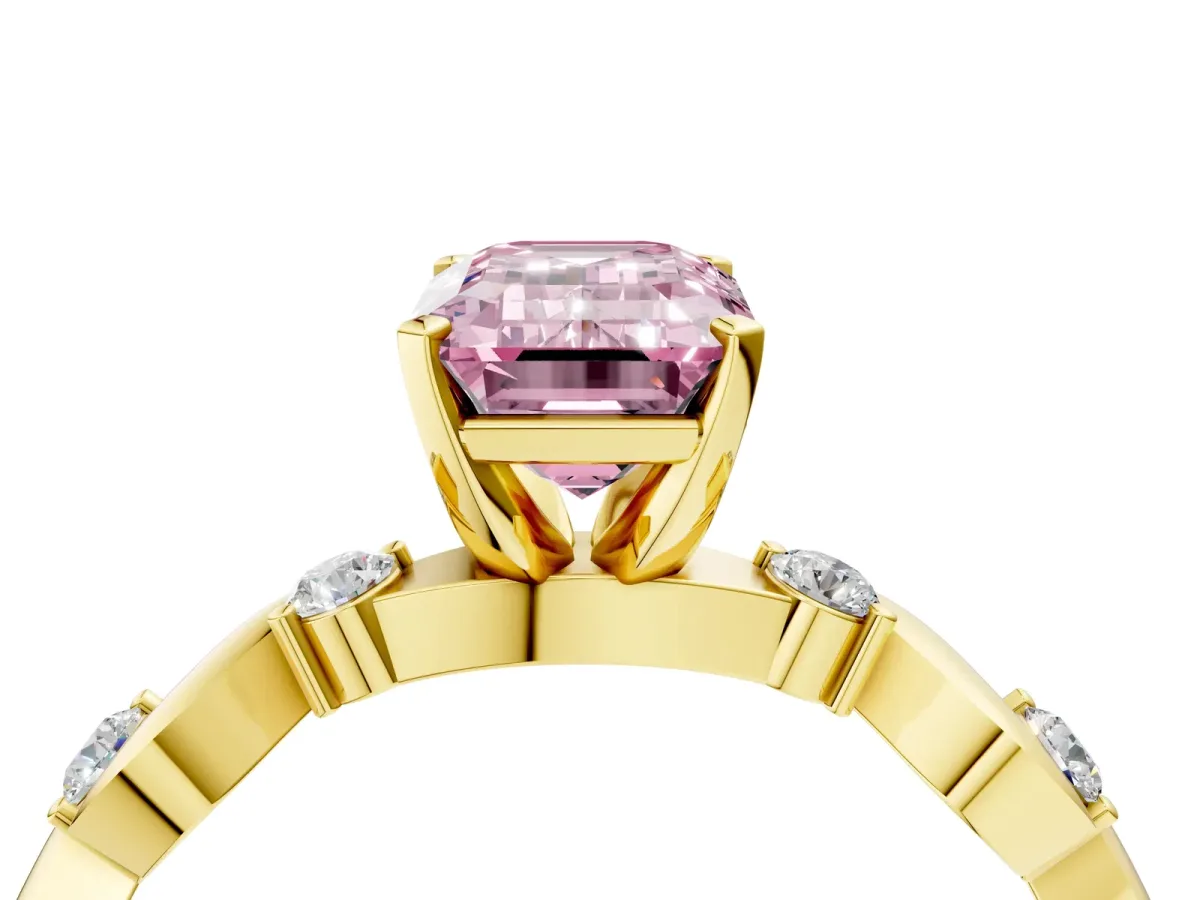 Fancy Pink Emerald Cut Diamond Solitaire Twisted Band with Round Accents and Prong Setting Yellow gold