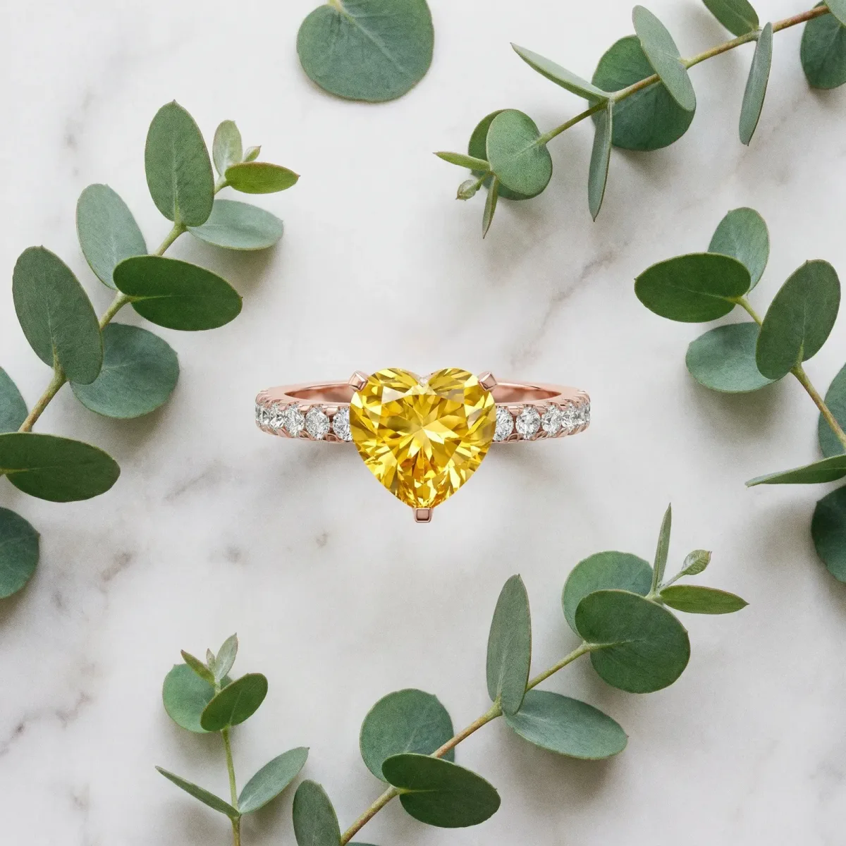 Heart Cut Yellow Sapphire Solitaire Ring with Round Pavé Band and Four-Prong Setting Rose gold