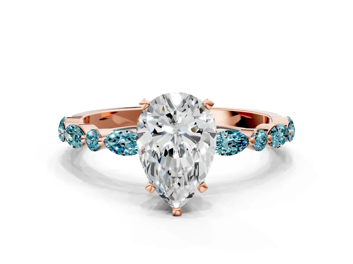 Pear Cut Diamond Ring with Marquise and Round Blue Topaz Side Stones and Four-Prong Setting Rose gold