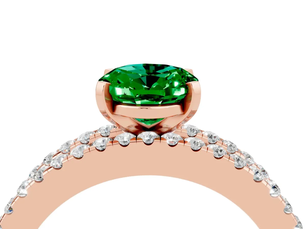 Oval Cut Emerald Solitaire Ring with Pavé and Channel Set Band Rose gold