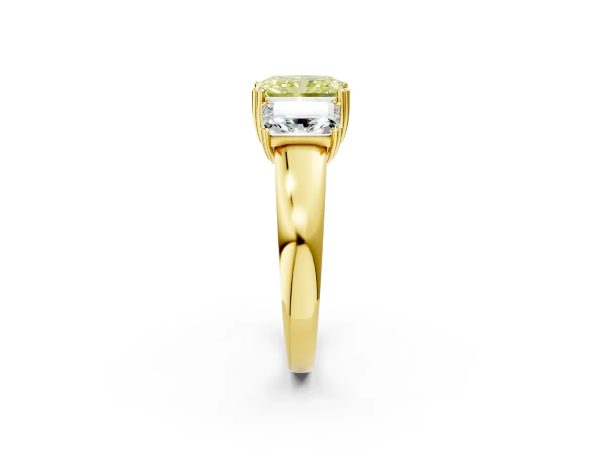 Fancy Yellow Three-Stone Radiant Cut Cut Diamond Ring with Channel Set Band and Four-Prong Setting Yellow gold