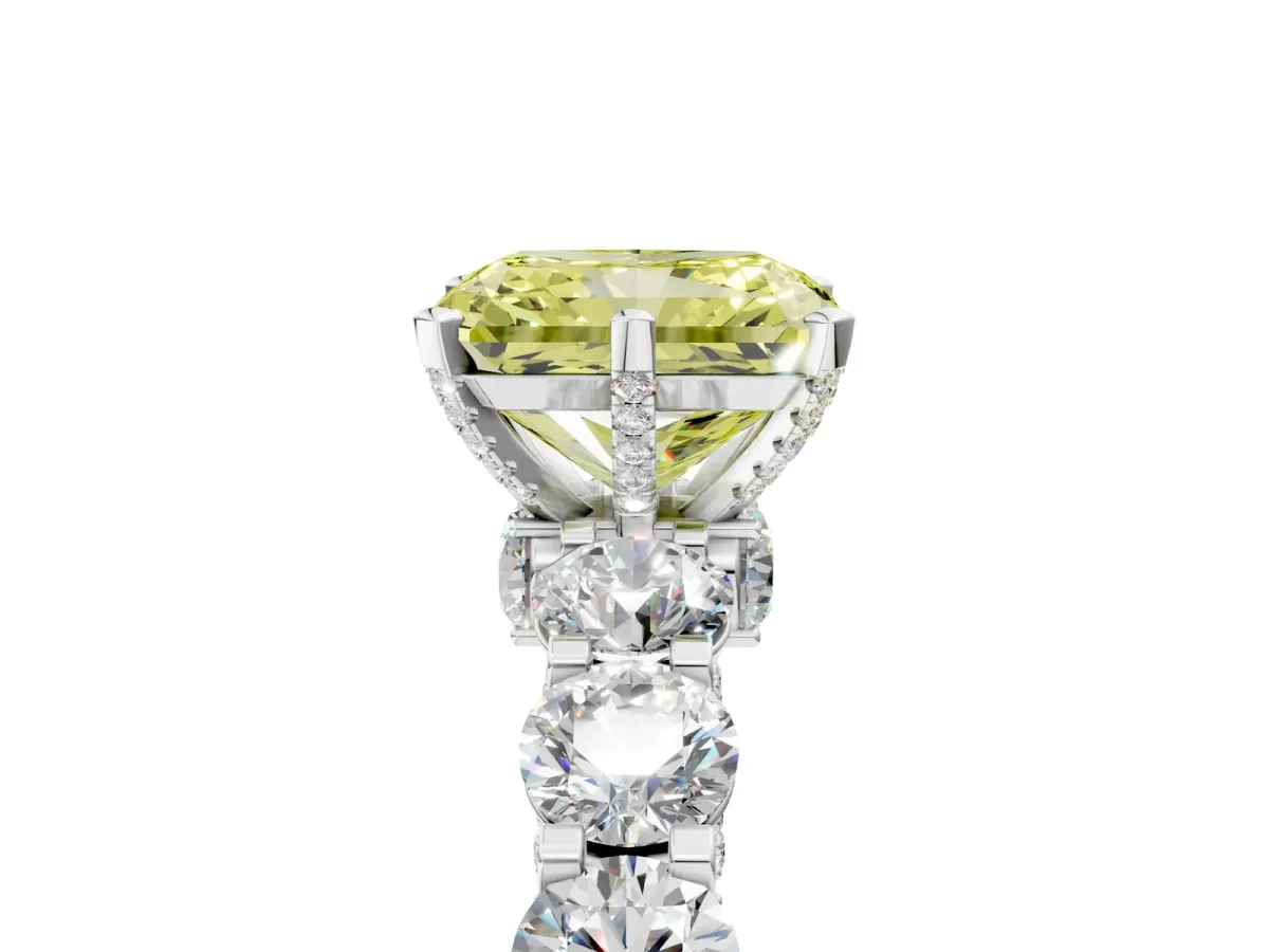 Fancy Yellow Radiant Cut Diamond Side Stone Engagement Ring with Four-Prong Setting Platinum