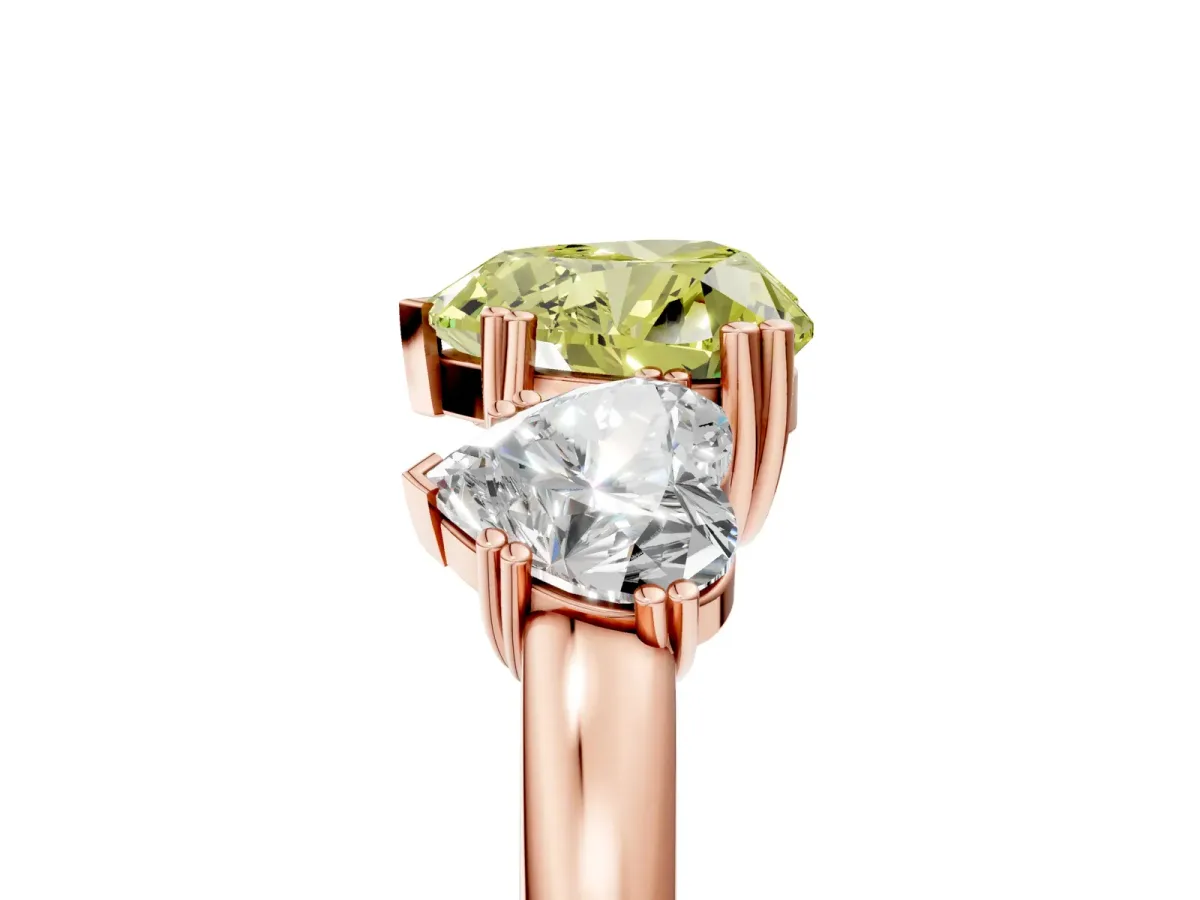 Fancy Yellow Three-Stone Heart Cut Cut Diamond Ring with Channel Set Band and Four-Prong Setting Rose gold