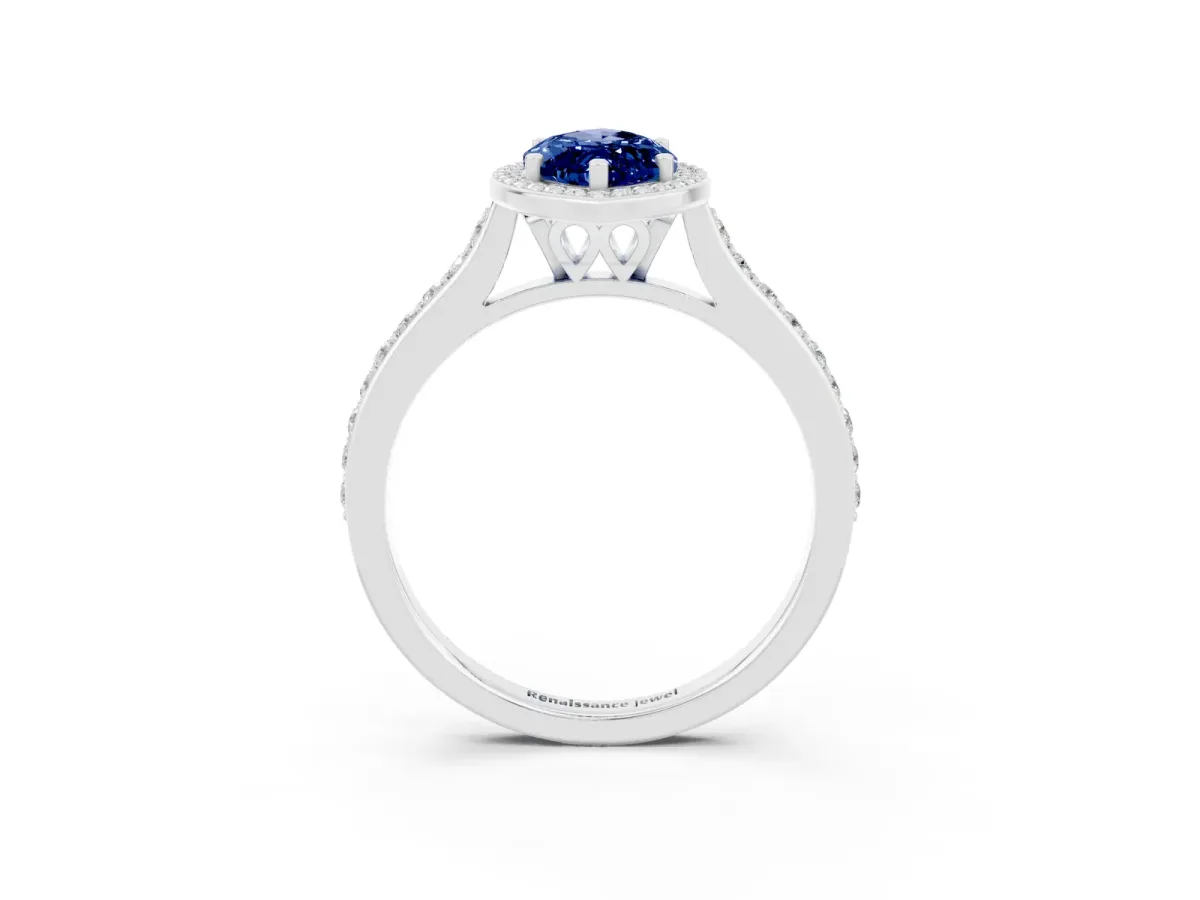 Marquise Cut Blue Sapphire Halo Engagement Ring with Round Pavé Shoulders and Prong Setting Platinum