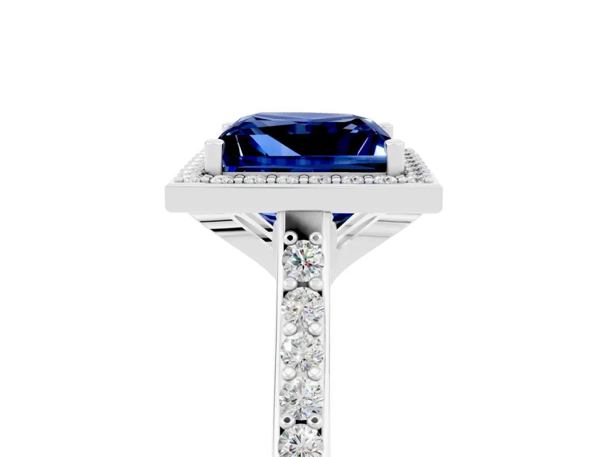 Princess Cut Blue Sapphire Halo Engagement Ring with Round Pavé Shoulders and Prong Setting Silver