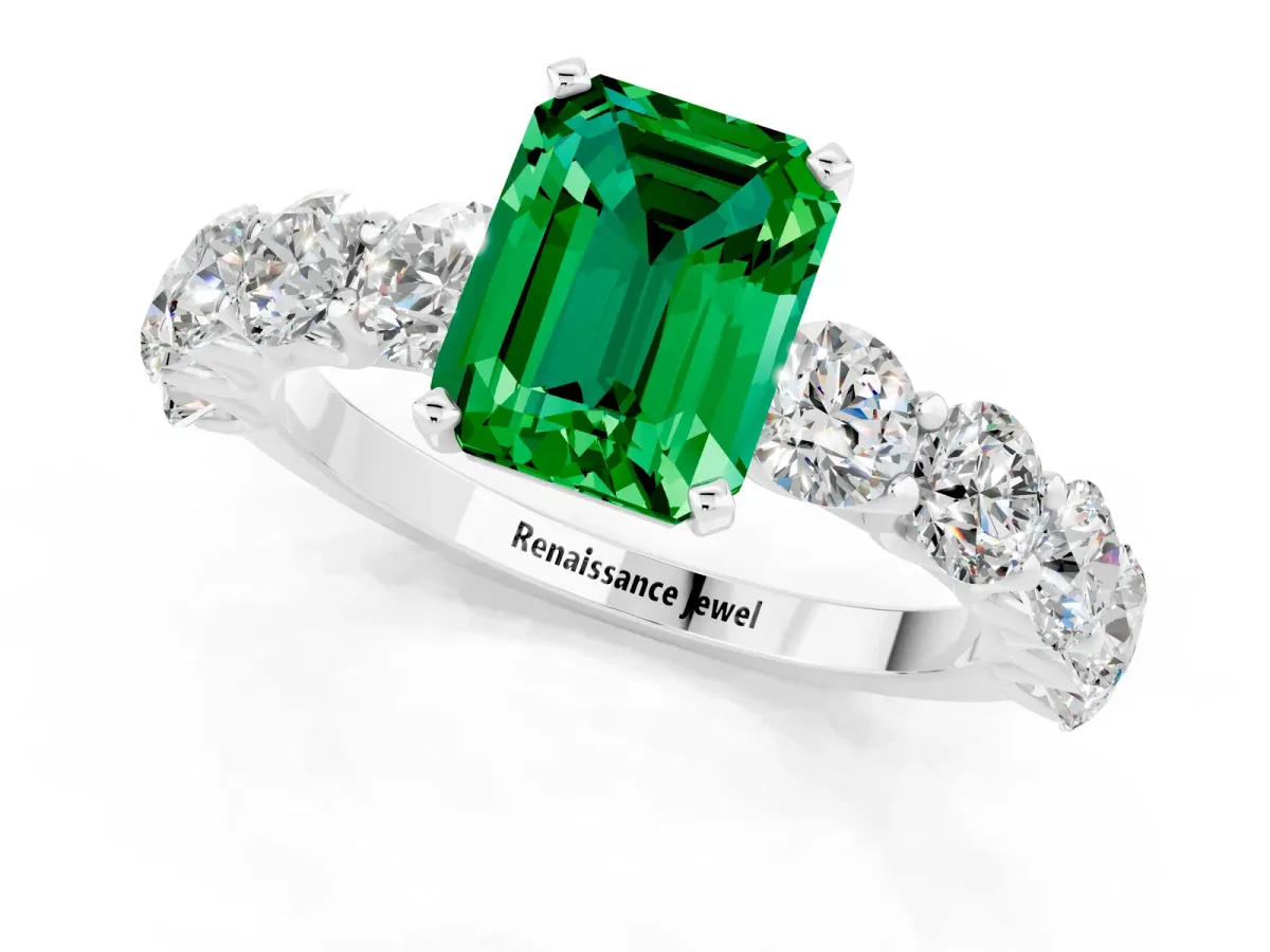 Emerald Cut Emerald Prong Setting with Side Stones on a Pave Band Silver