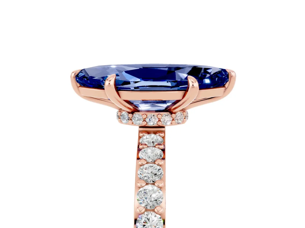 Marquise Cut Blue Sapphire Solitaire Engagement Ring with Pavé Band and Four-Prong Setting Rose gold