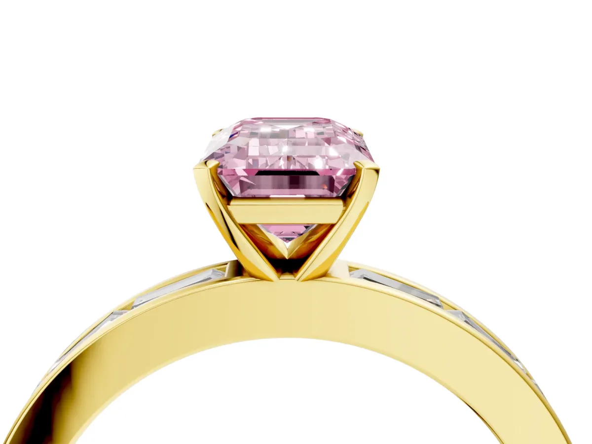 Fancy Pink Emerald Cut Solitaire Diamond Ring with Channel-Set Baguette Band and Four-Prong Setting Yellow gold