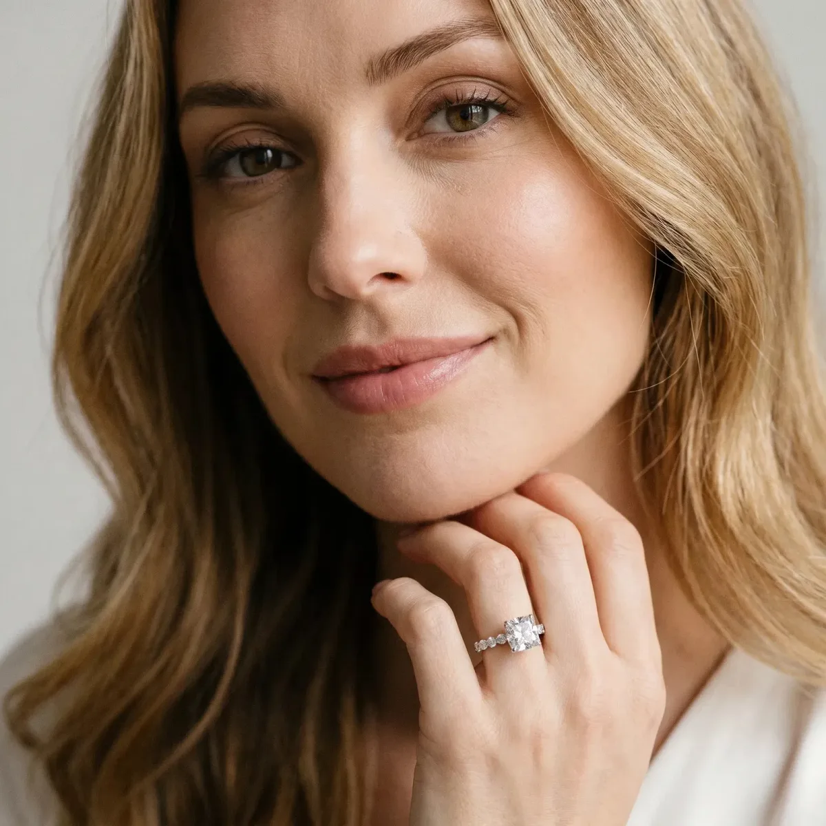 Cushion Cut Solitaire Diamond Ring with Pave Band and Four-Prong Setting Platinum