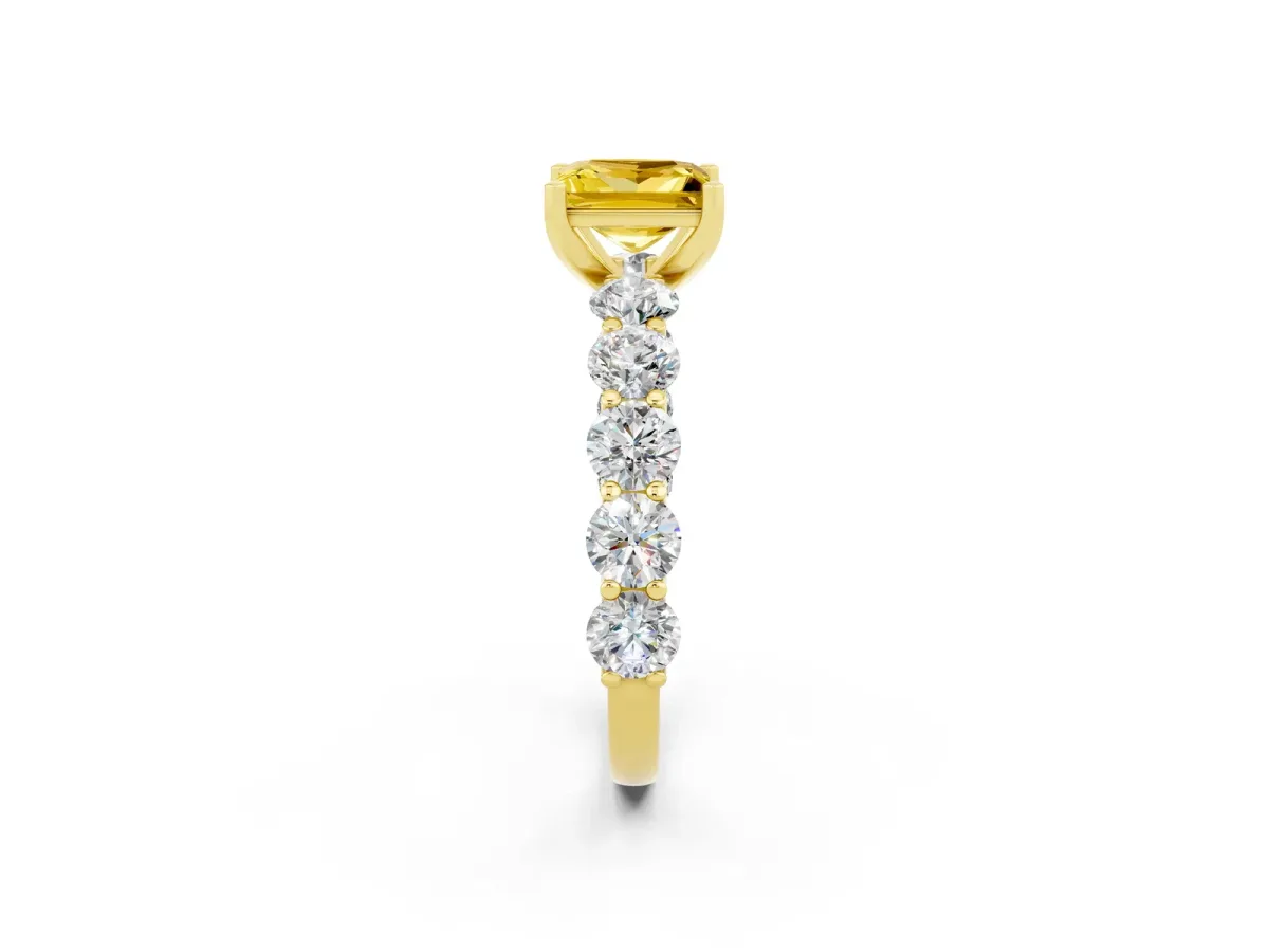 Princess Cut Yellow Sapphire Prong Setting with Side Stones on a Pave Band Yellow gold