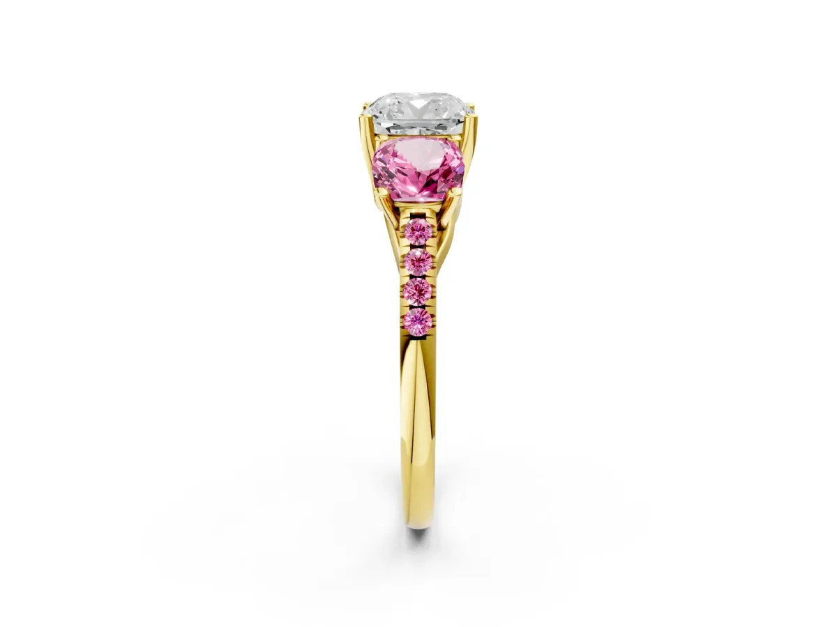 Three-Stone Cushion Cut Diamond Ring with Round Pink Sapphire Pavé Band and Prong Setting Yellow gold