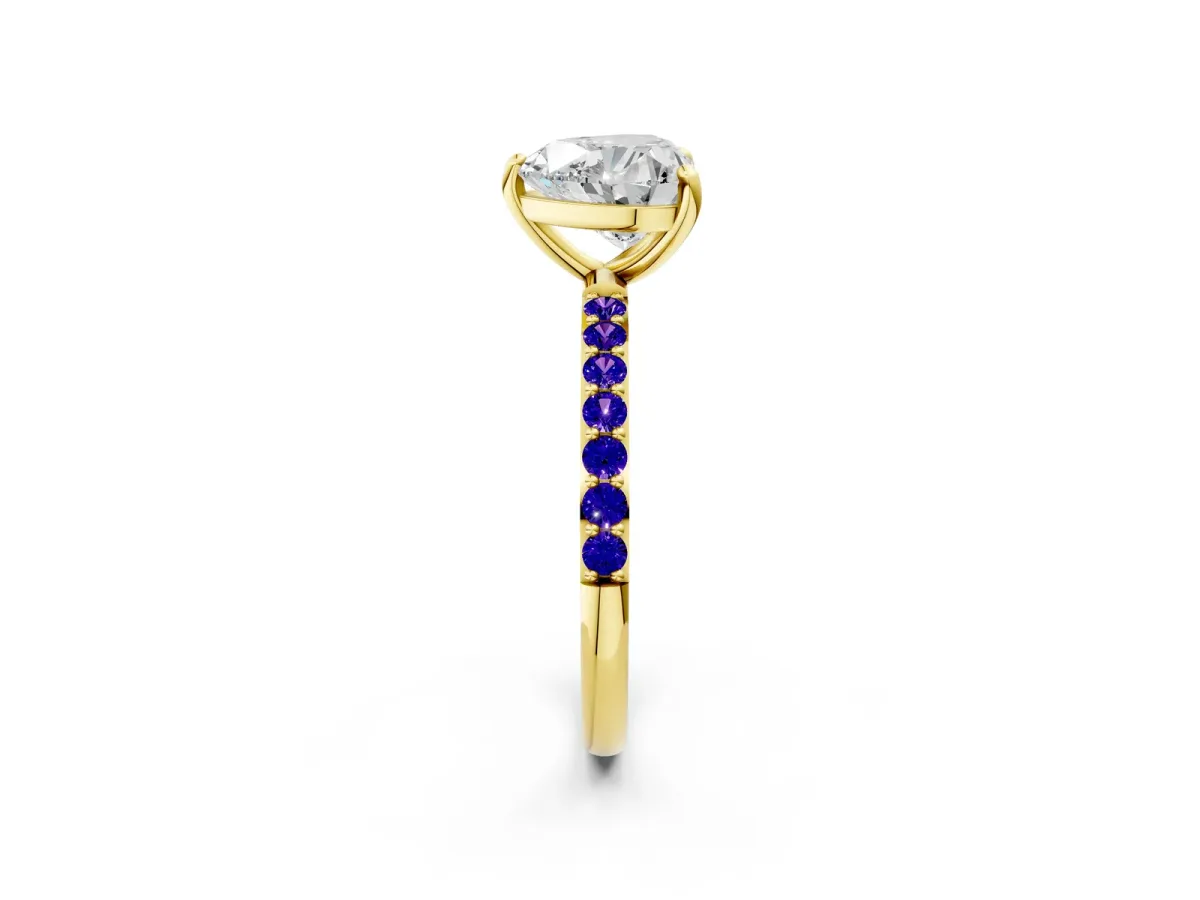 Heart Cut Diamond Solitaire Ring with Round Tanzanite Pavé Band and Prong Setting Yellow gold