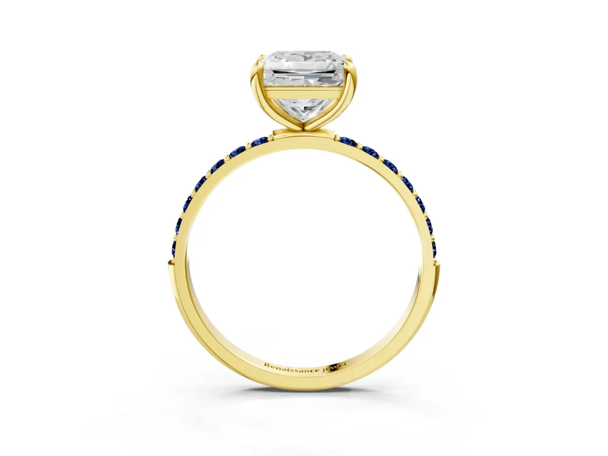 Princess Cut Diamond Solitaire Ring with Round Blue Sapphire Pavé Band and Prong Setting Yellow gold