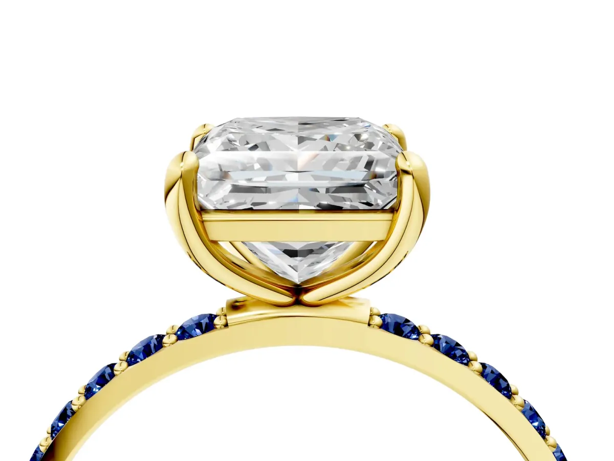 Princess Cut Diamond Solitaire Ring with Round Blue Sapphire Pavé Band and Prong Setting Yellow gold