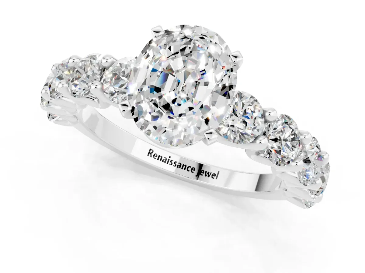 Oval Cut Moissanite Prong Setting with Side Stones on a Pave Band Silver
