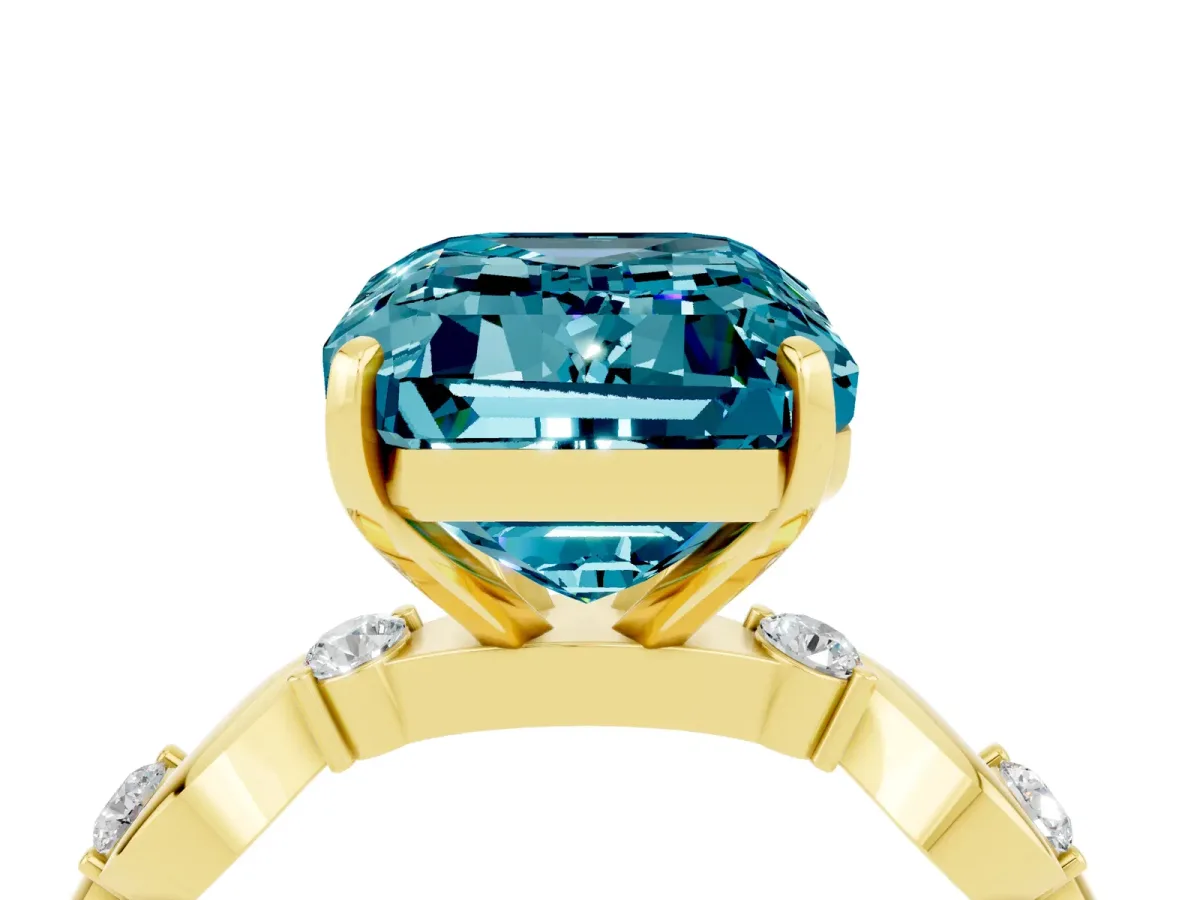 Emerald Cut Blue Topaz Solitaire Twisted Band with Round Accents and Prong Setting Yellow gold