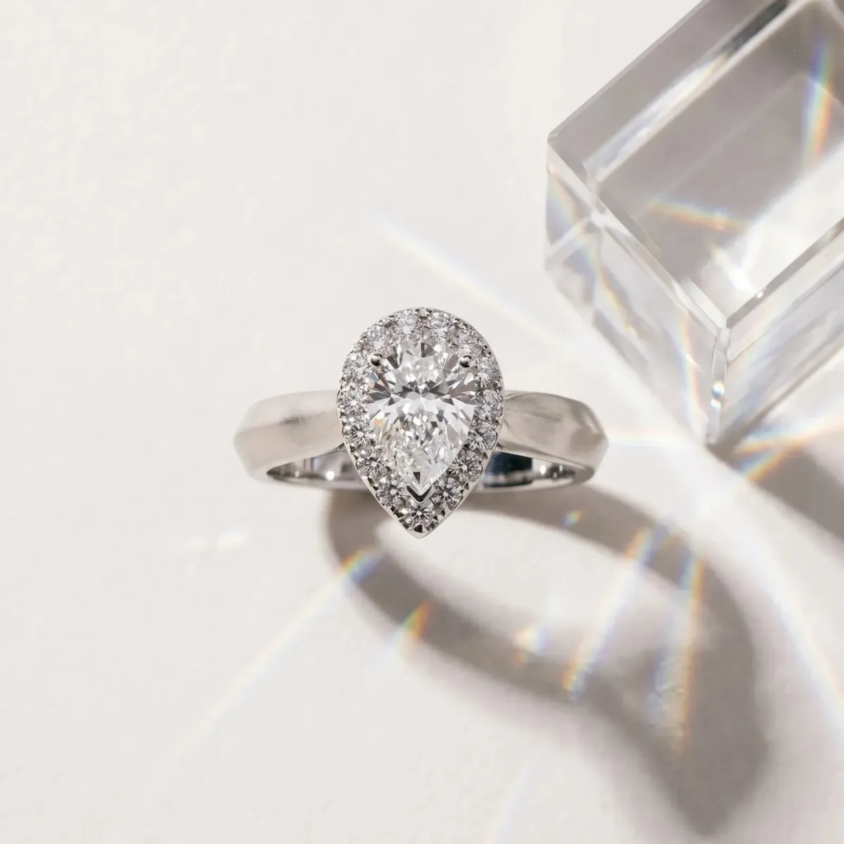 Halo Pear Cut Cut Solitaire Diamond Ring with Prong Setting Silver