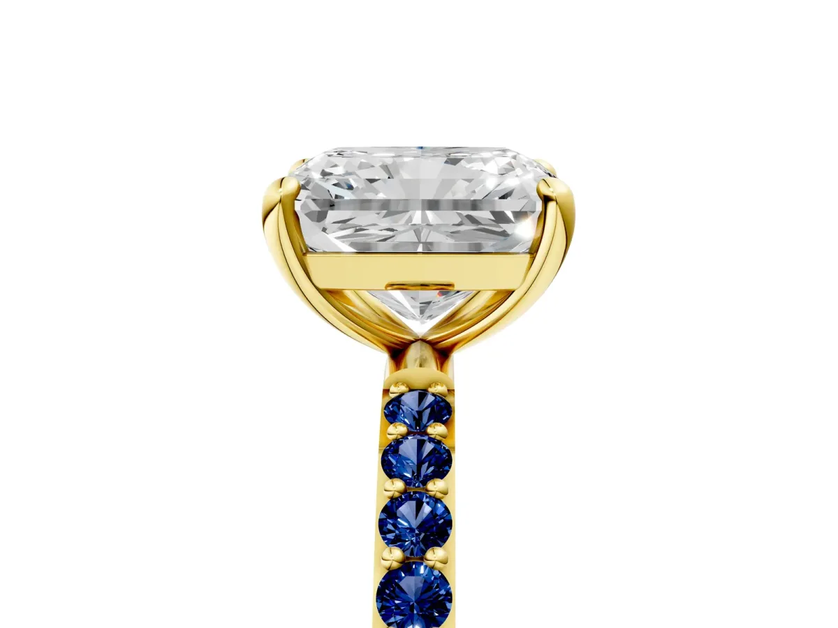 Radiant Cut Diamond Solitaire Ring with Round Blue Sapphire Pavé Band and Prong Setting Yellow gold