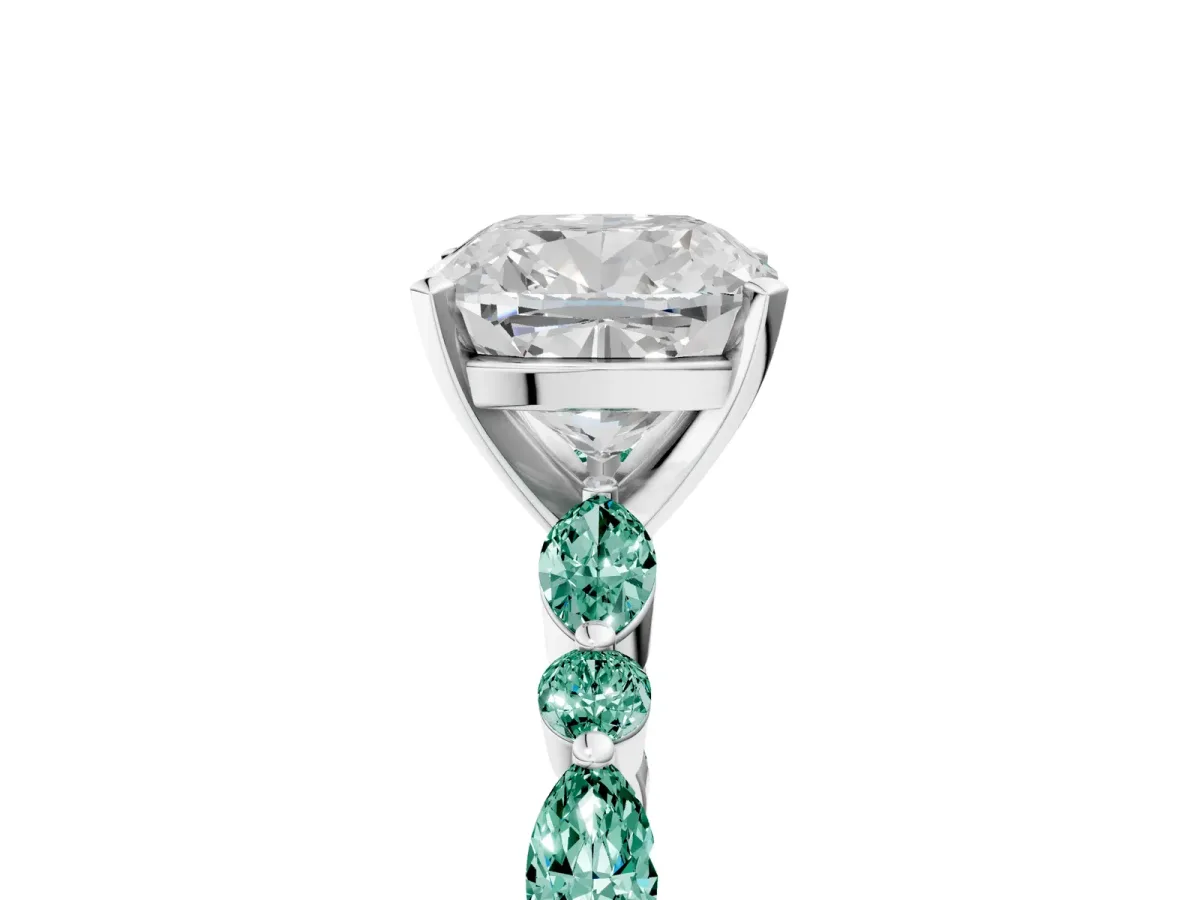 Cushion Cut Diamond Ring with Marquise and Round Green Sapphire Side Stones and Four-Prong Setting Platinum