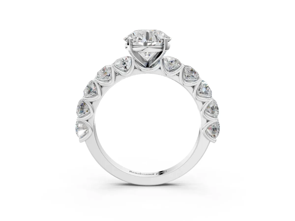 Round Cut Diamond Prong Setting with Side Stones on a Pave Band White gold