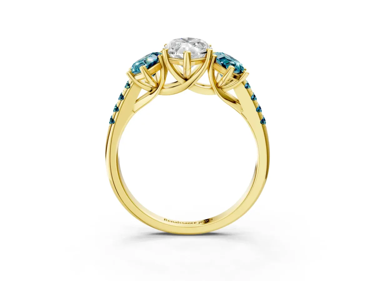 Three-Stone Marquise Cut Diamond Ring with Round Blue Topaz Pavé Band and Prong Setting Yellow gold
