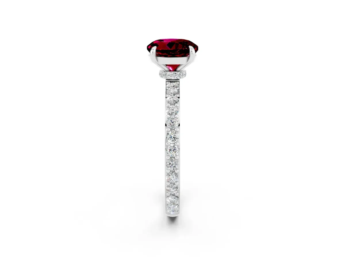 Round Cut Garnet Solitaire Engagement Ring with Pavé Band and Four-Prong Setting Silver