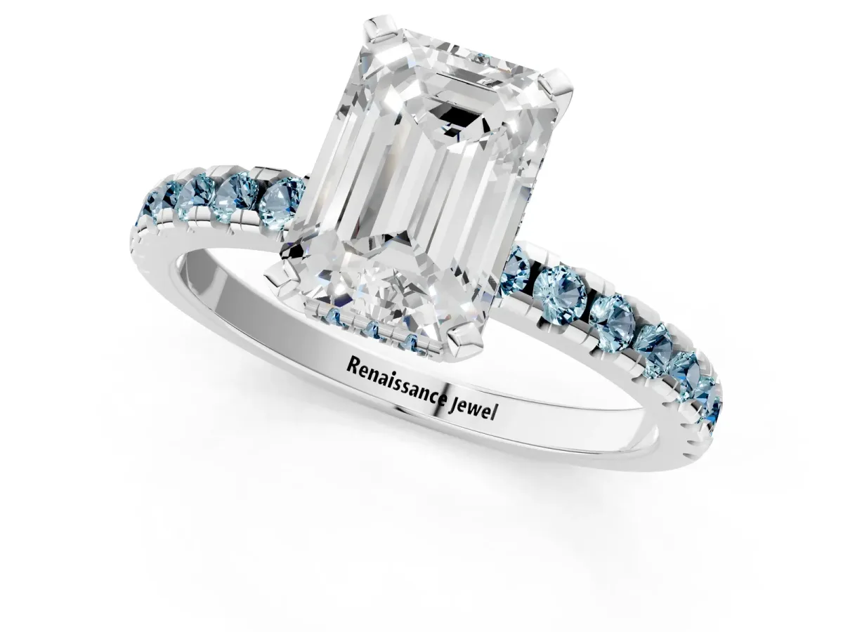 Emerald Cut Diamond Solitaire Ring with Round Aquamarine Pavé Band and Four-Prong Setting White gold