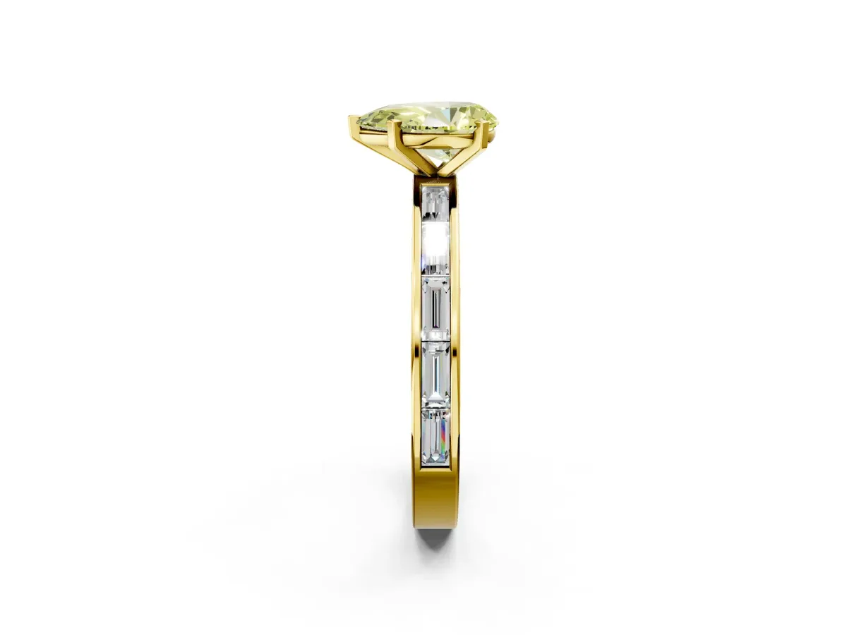 Fancy Yellow Pear Cut Solitaire Diamond Ring with Channel-Set Baguette Band and Four-Prong Setting Yellow gold