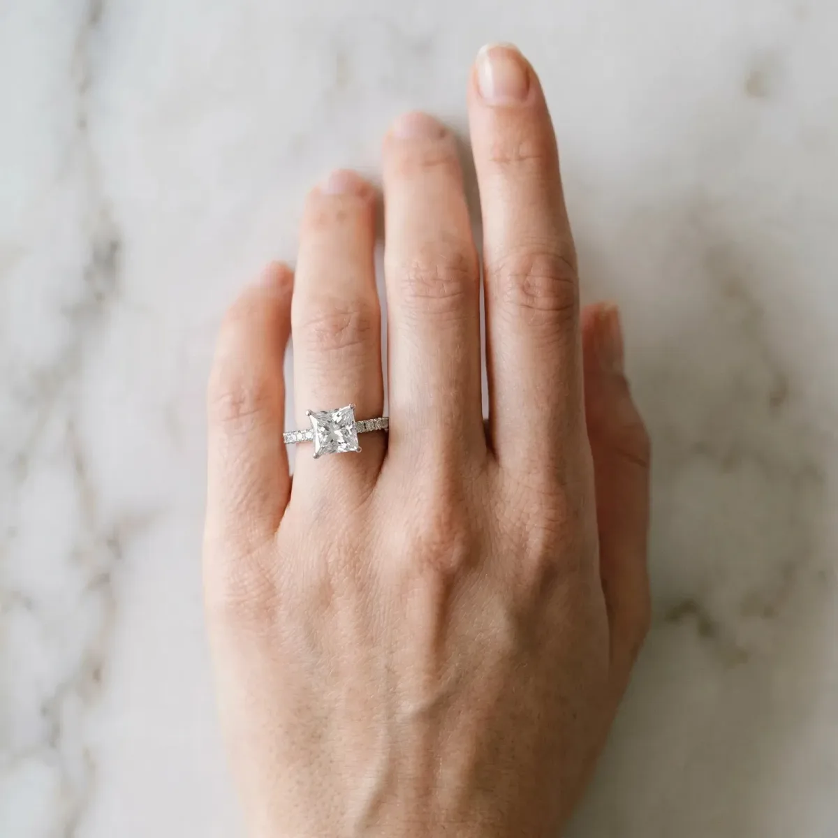 Princess Cut Diamond Solitaire Pavé Band with Four-Prong Setting Platinum