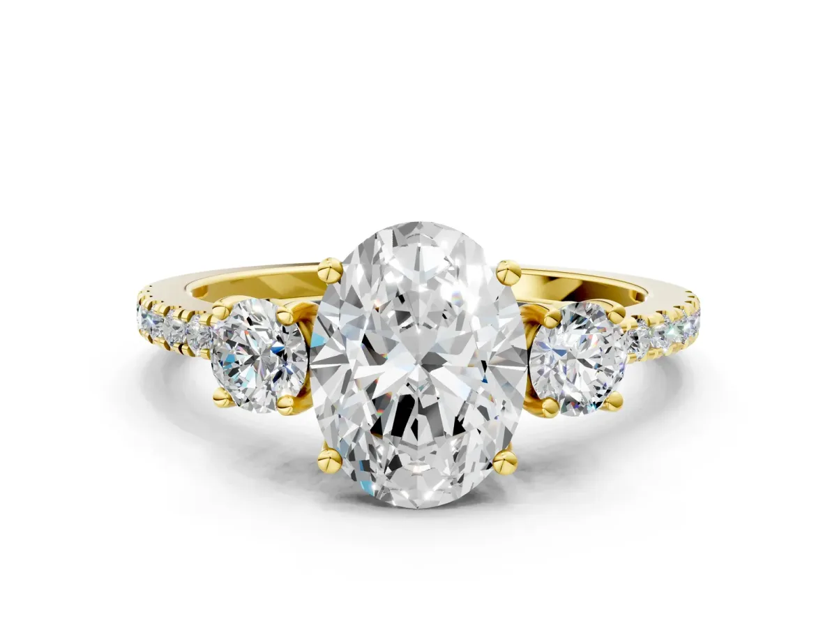 Three-Stone Oval Cut Cut Diamond Pavé Band with Prong Setting Yellow gold