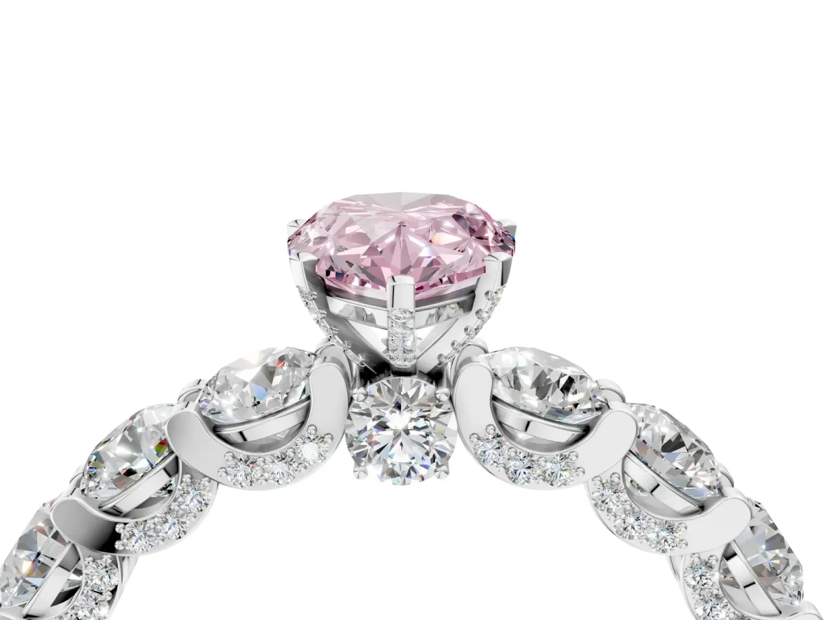 Fancy Pink Pear Cut Diamond Side Stone Engagement Ring with Four-Prong Setting Platinum