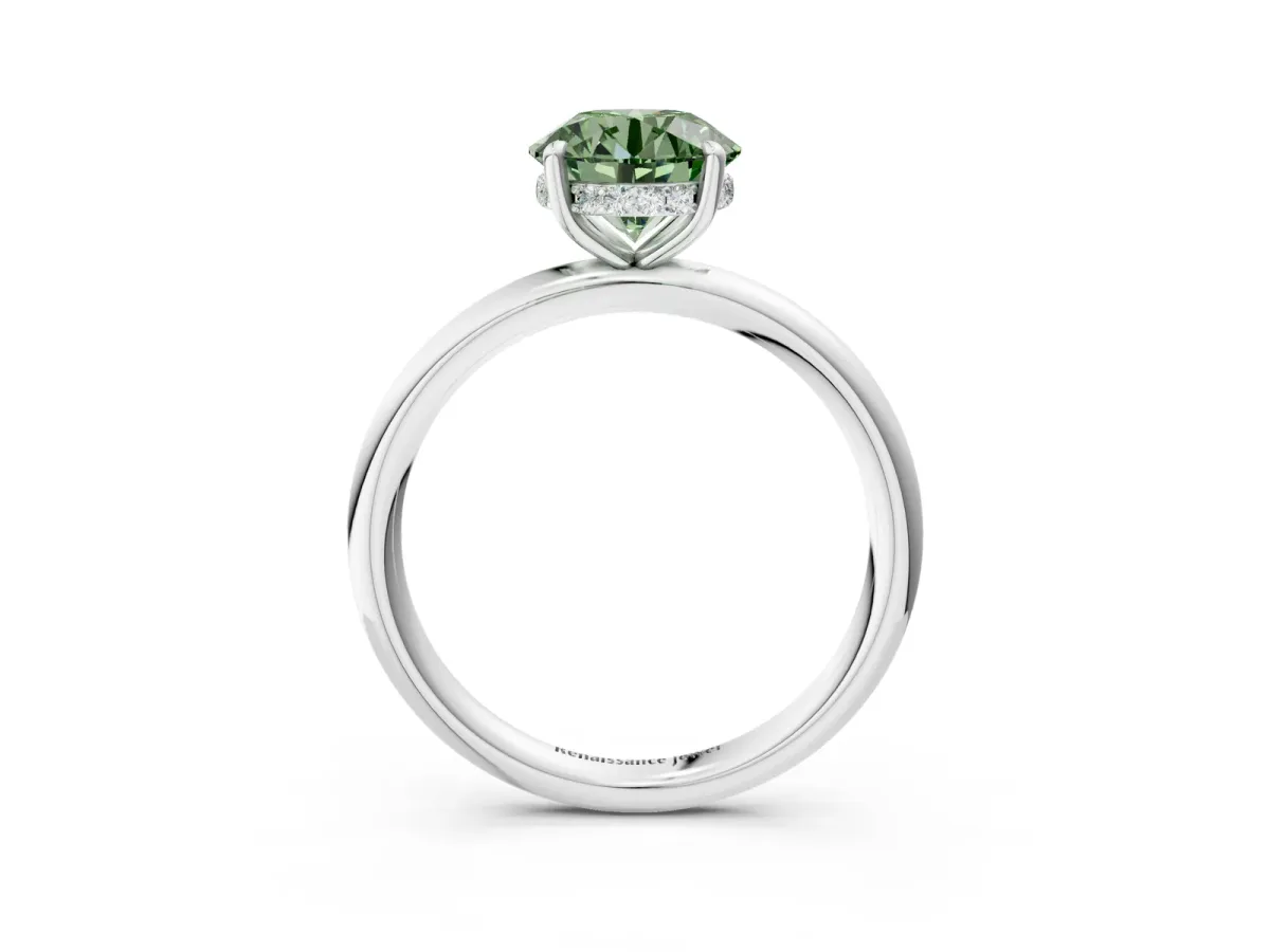 Fancy Green Round Cut Diamond Solitaire Ring with Thin Band and Four-Prong Setting Silver