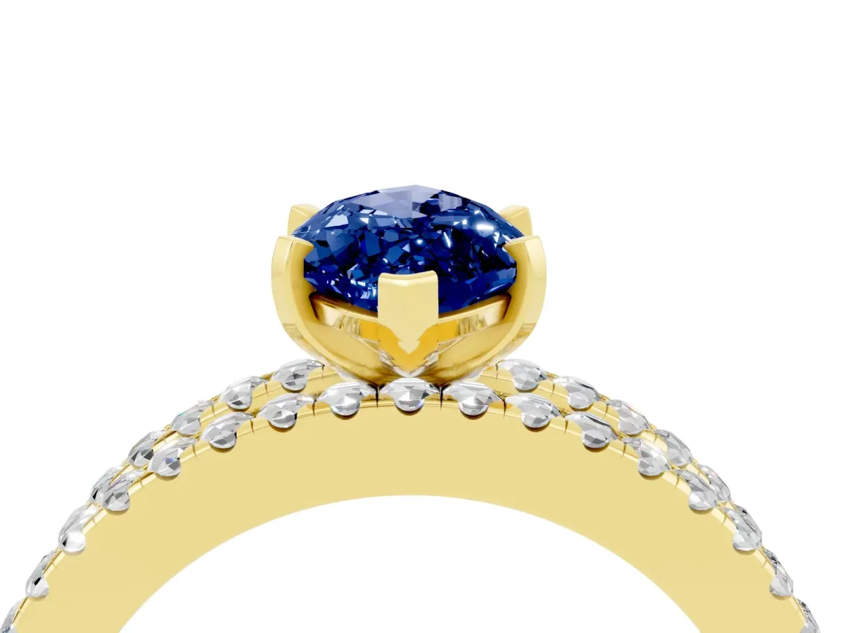 Marquise Cut Blue Sapphire Solitaire Ring with Pavé and Channel Set Band Yellow gold