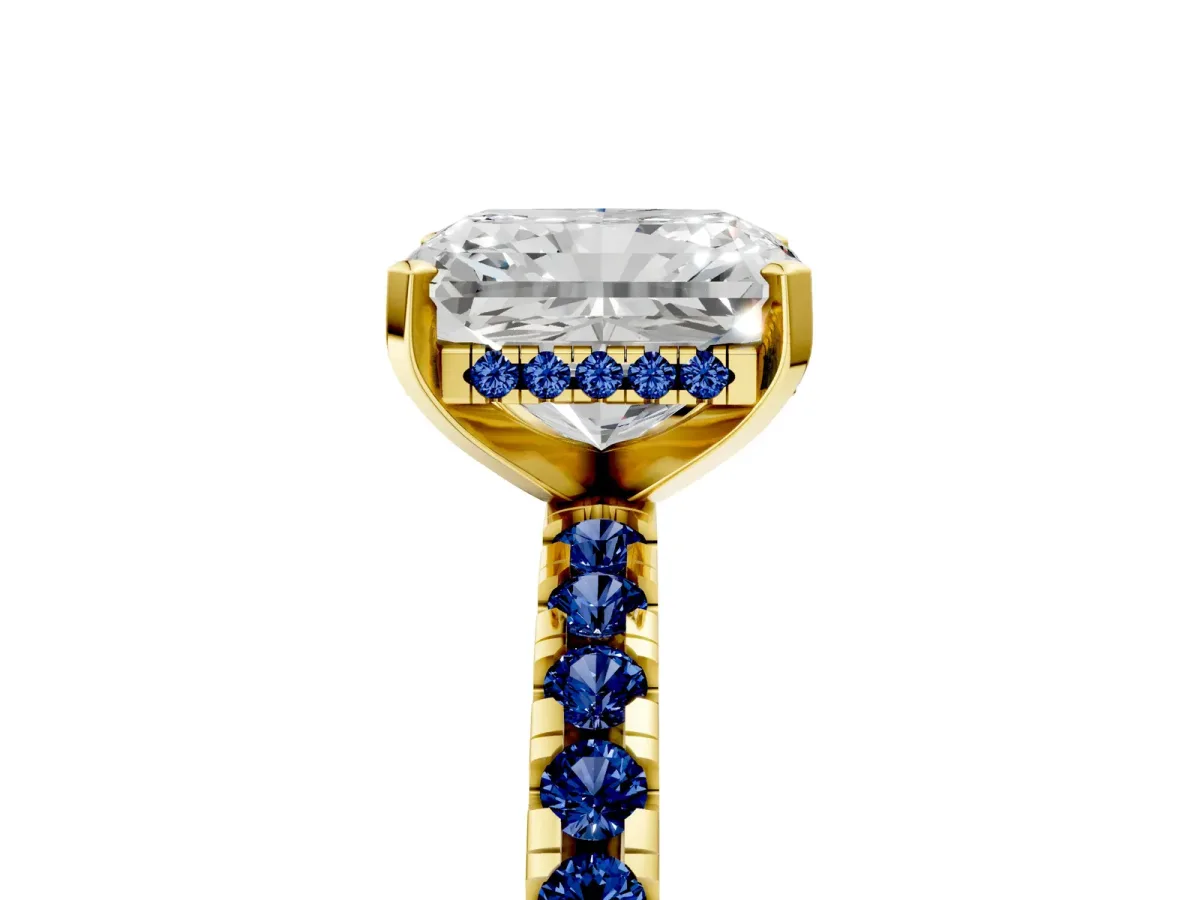 Radiant Cut Diamond Solitaire Ring with Round Blue Sapphire Pavé Band and Four-Prong Setting Yellow gold